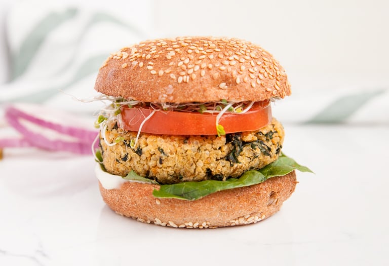 Garlicky Kale Burger on a Silver Hills Bakery sprouted whole grain burger bun with sesame seeds