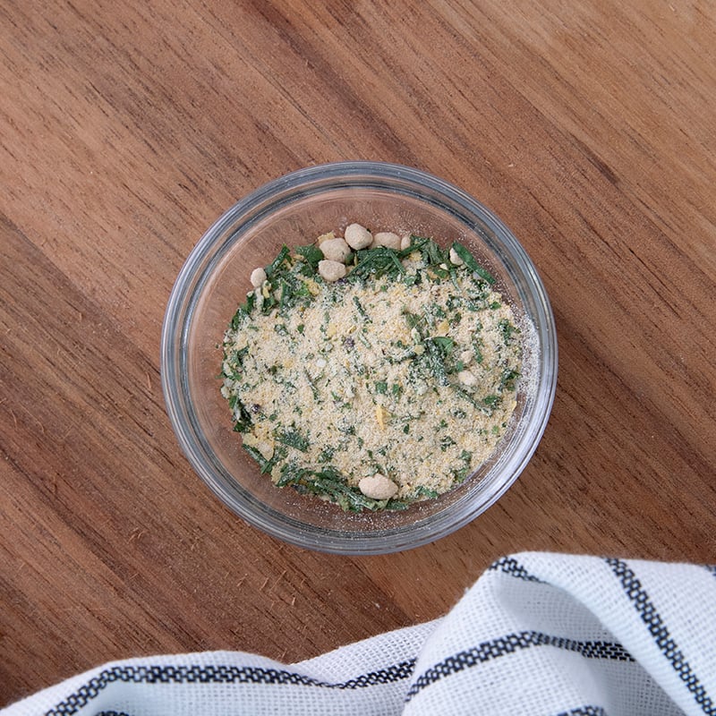 A little bowl with herbs and lentils