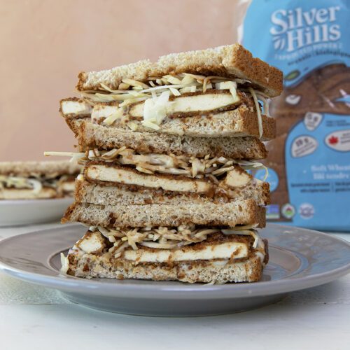 A stack of Crispy Air Fryer Tofu Katsu Sando with Sprouted Breadcrumbs, Easy Vegan Katsu Sauce + Shortcut Plant-Based Japanese Mayo
